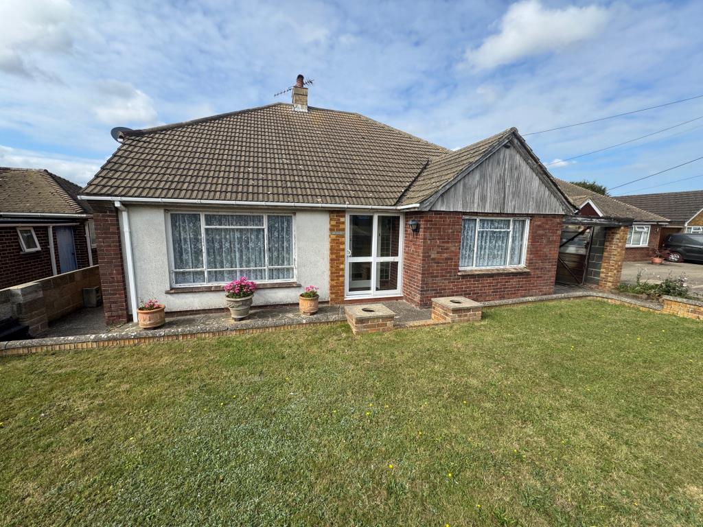 Lot: 36 - DETACHED THREE-BEDROOM BUNGALOW FOR IMPROVEMENT ON APPROX THIRD ACRE PLOT - Front of bungalow